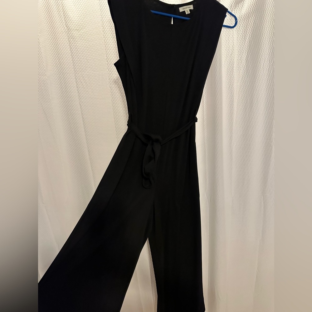 Black wide leg jumpsuit with keyhole back and tie waist